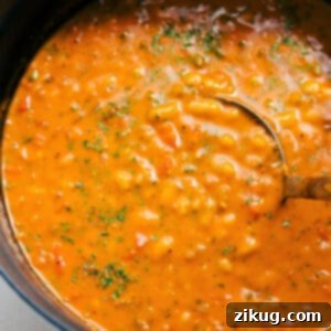 A hearty bowl of creamy White Bean Soup with fresh herbs.