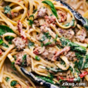 Velvety Sausage Pasta 2 A delicious bowl of Creamy Sausage Pasta garnished with fresh herbs, ready to be enjoyed.