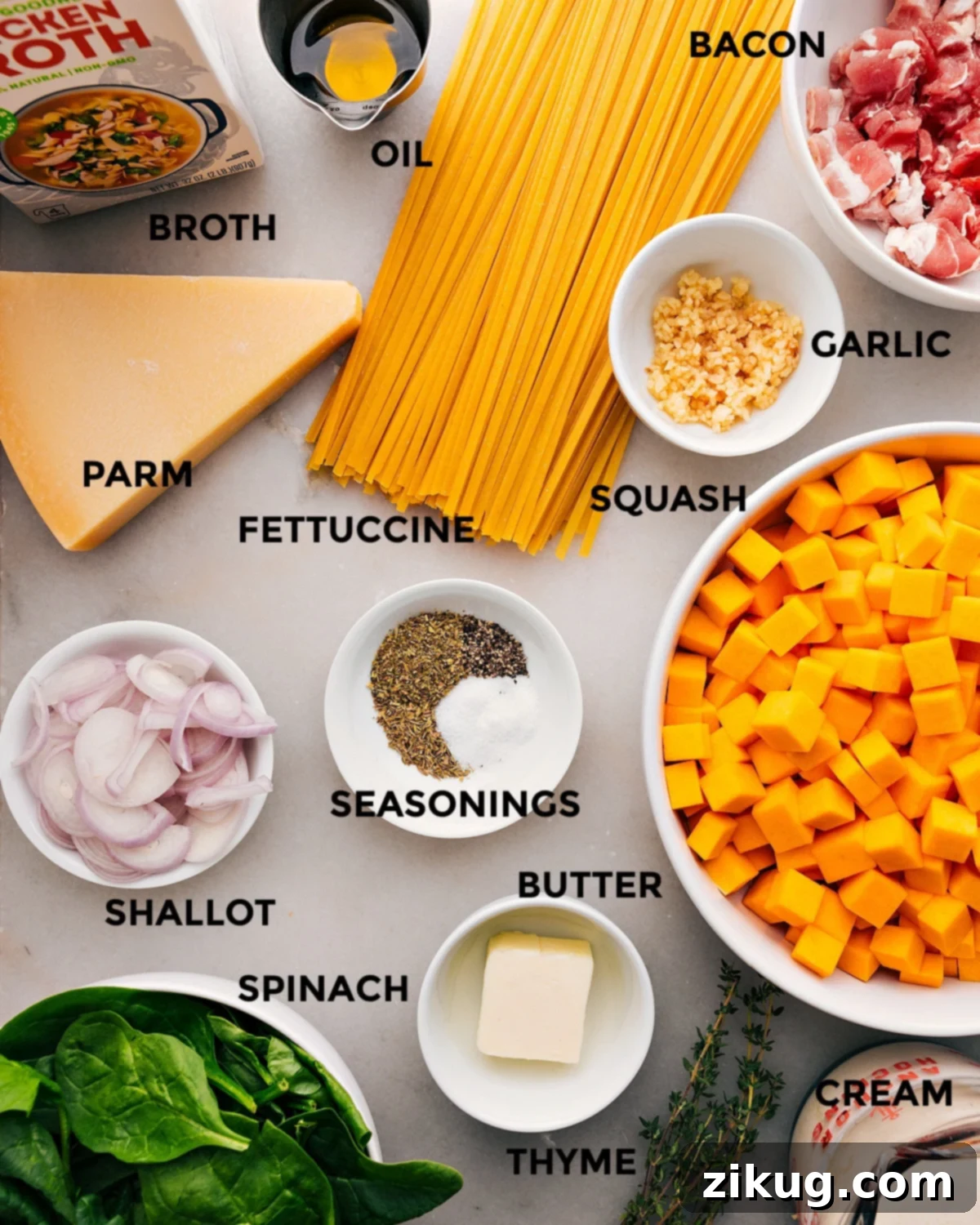 Essential Ingredients for Butternut Squash Pasta Recipe All the ingredients for this recipe are prepped and ready for easy assembly, including fettuccine, garlic, bacon, oil, broth, Parmesan, shallots, butter, and veggies.