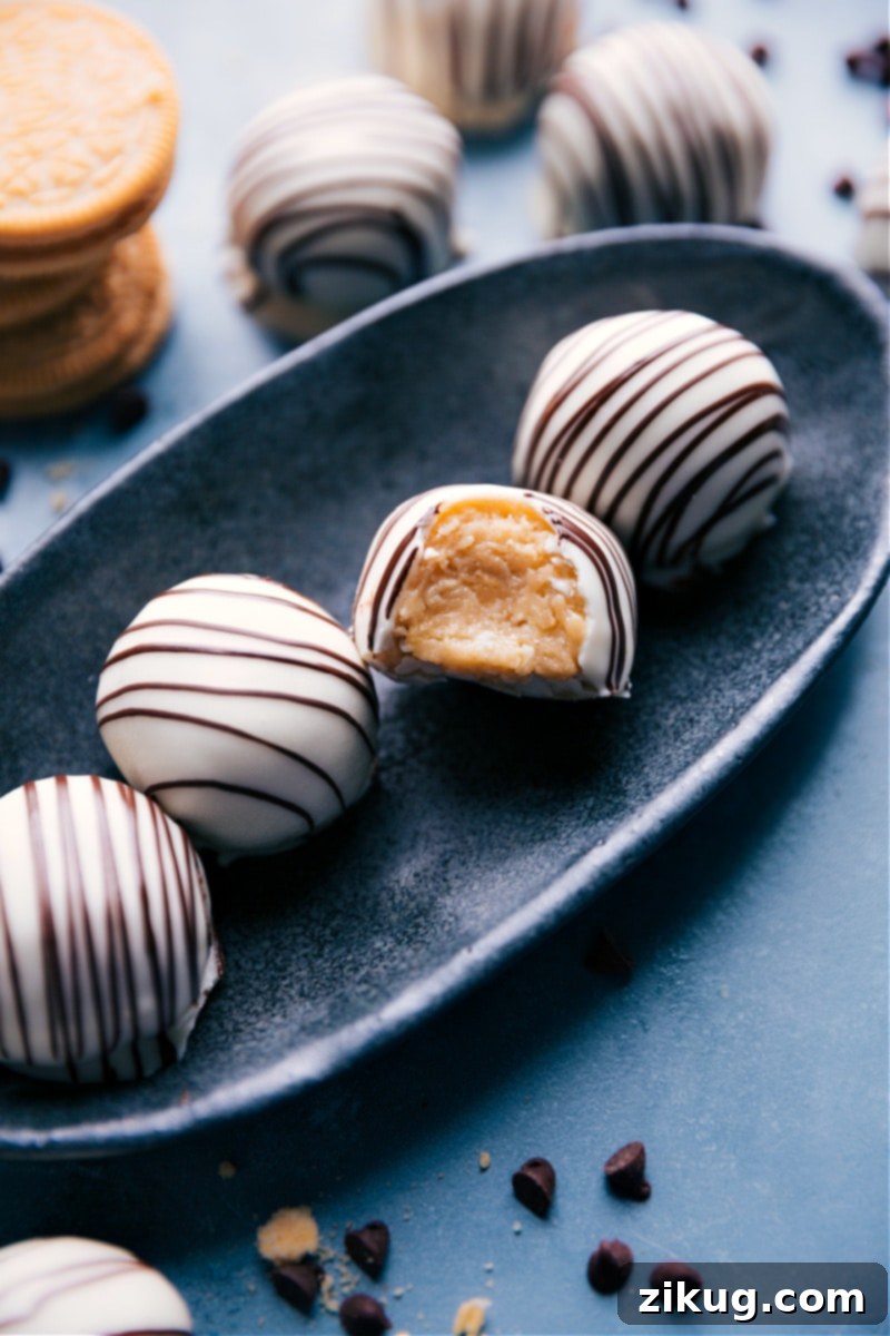 Golden Oreo Truffles: A no-bake, easy, and delicious dessert perfect for any occasion, dipped in melted chocolate and customizable with various decorations. Image of the Golden Oreo Truffles, beautifully dipped in white chocolate and ready to serve.