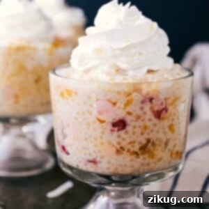 A bowl of creamy Frog Eye Salad, garnished with marshmallows.