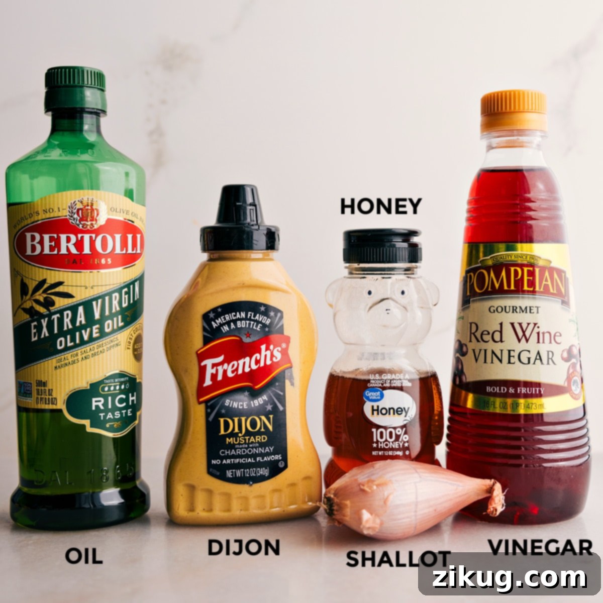 Key Ingredients for a Delicious Homemade Honey-Dijon Salad Dressing All the essential dressing ingredients: olive oil, Dijon mustard, honey, red wine vinegar, and a finely minced shallot.