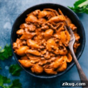 A generous serving of homemade Creamy Beef and Shells, garnished and ready to eat.