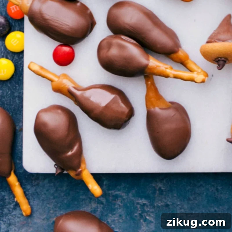 Fun and Tasty Candy Turkey Legs for Thanksgiving Candy turkey legs made with pretzels, caramel, and chocolate.