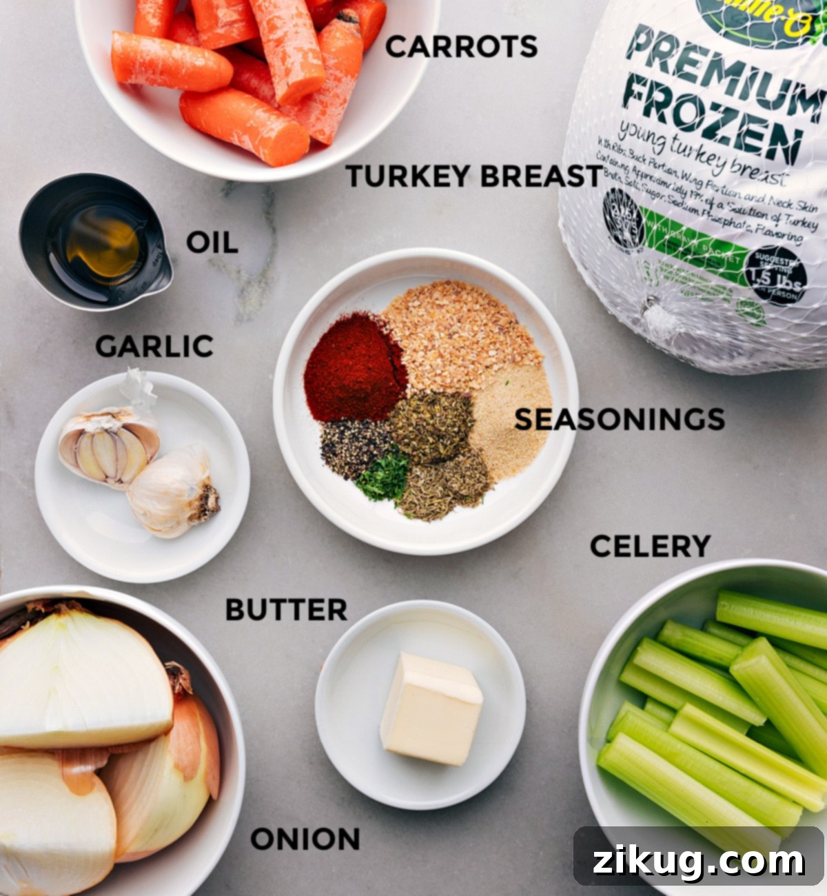 A vibrant selection of fresh ingredients, including creamy butter, aromatic yellow onions, crisp celery stalks, bright orange carrots, and a variety of dried seasonings, meticulously arranged for the Crockpot Turkey Breast recipe preparation.
