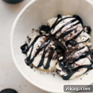 A bowl of creamy, rich hot fudge sauce, ready to be poured over your favorite dessert.