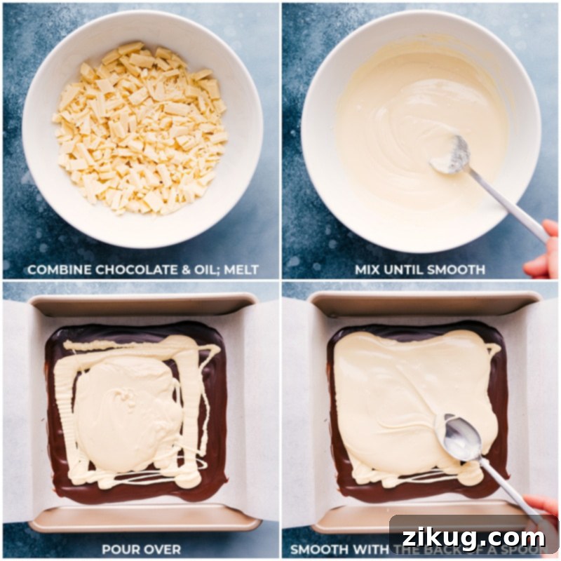 The delicate second layer: spreading white chocolate for our delicious Peppermint Bark recipe. Process shot of smooth white chocolate being carefully spread over the set dark chocolate base, forming the second layer of Peppermint Bark.