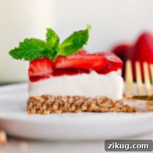 Sweet & Salty: Your New Favorite Strawberry Pretzel Salad 3 Strawberry Pretzel Salad on a plate ready to be enjoyed.