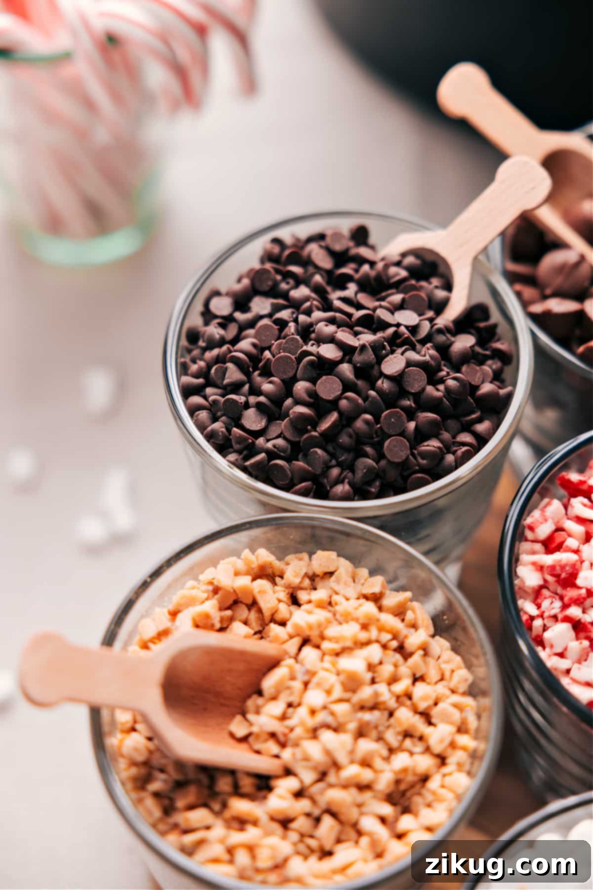 Decadent Toppings: Chocolate Chips and Toffee Delight Two bowls side by side, one filled with chocolate chips and the other with crushed toffee pieces.