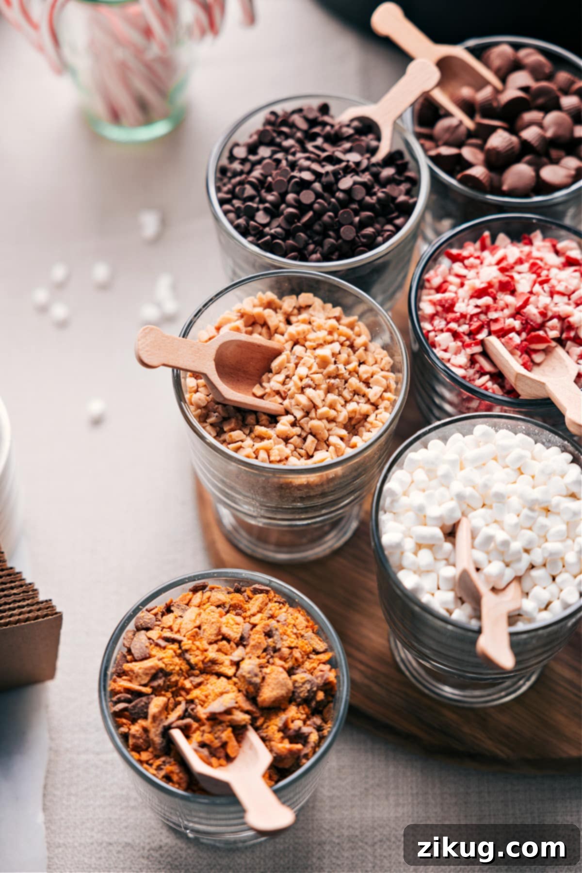 Scoop and Savor: An Assortment of Delectable Toppings Variety of toppings in containers, each accompanied by a small scoop.