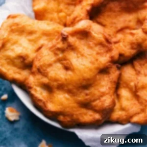 Delicious homemade Fry Bread, golden brown and perfectly puffed, ready to be served.