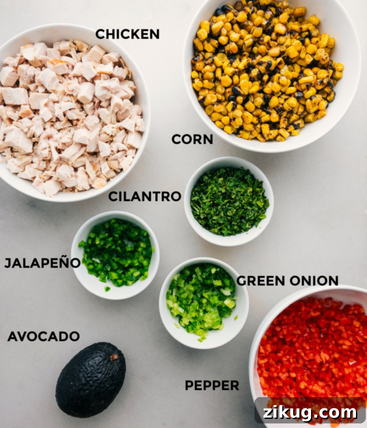 The ingredients for Mexican street corn chicken salad prepped out for easy assembly.