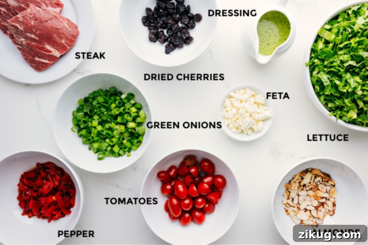 Overhead view of steak salad ingredients being prepared: steak grilling, vegetables being sliced, and dressing ingredients being blended.