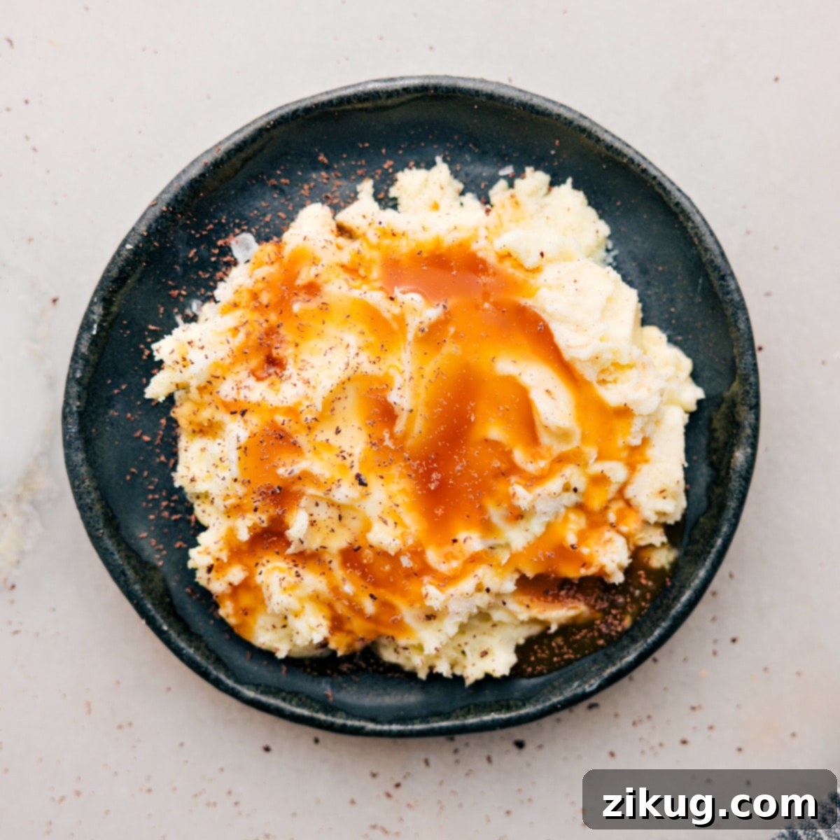 April Fools Mashed Potatoes Prank April Fools Food Prank: Mashed Potatoes made from vanilla cheesecake with caramel syrup 'gravy' and grated dark chocolate 'pepper'.