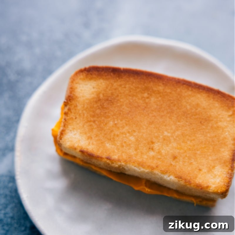April Fools Sweet Grilled Cheese Prank April Fools Food Prank: Sweet 'Grilled Cheese Sandwich' made from buttered pound cake, toasted, and filled with orange-tinted vanilla frosting.