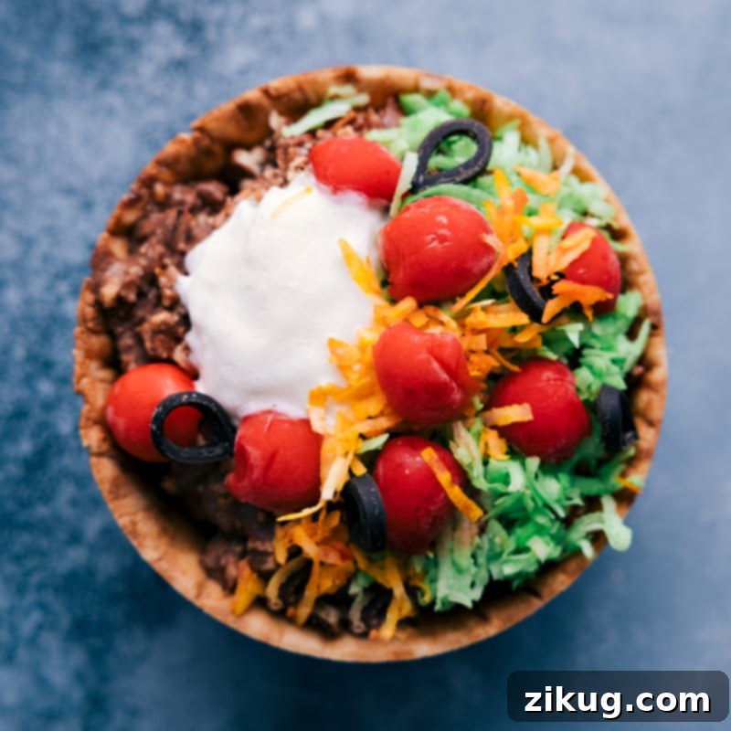 April Fools Sweet Taco Bowl Prank April Fools Food Prank: Sweet 'Taco Bowl' made from waffle bowls, chocolate ice cream, pecan 'ground beef', coconut 'cheese/lettuce', maraschino cherry 'tomatoes', licorice 'olives', and whipped cream 'sour cream'.