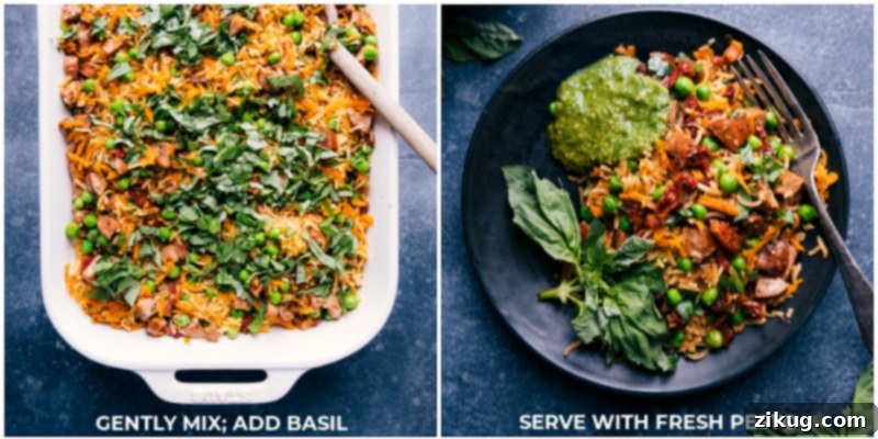 A final close-up image illustrating the last step of preparing One-Pan Pesto Rice: gently mixing in fresh basil and serving the dish with an extra dollop of vibrant pesto on top, ready to be enjoyed.