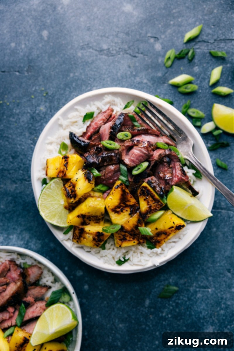 Overhead image of the pineapple steak with coconut-lime rice and fresh cilantro