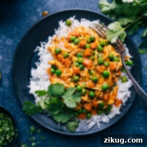 Garam Masala Chicken dish in a serving bowl, garnished with fresh cilantro.