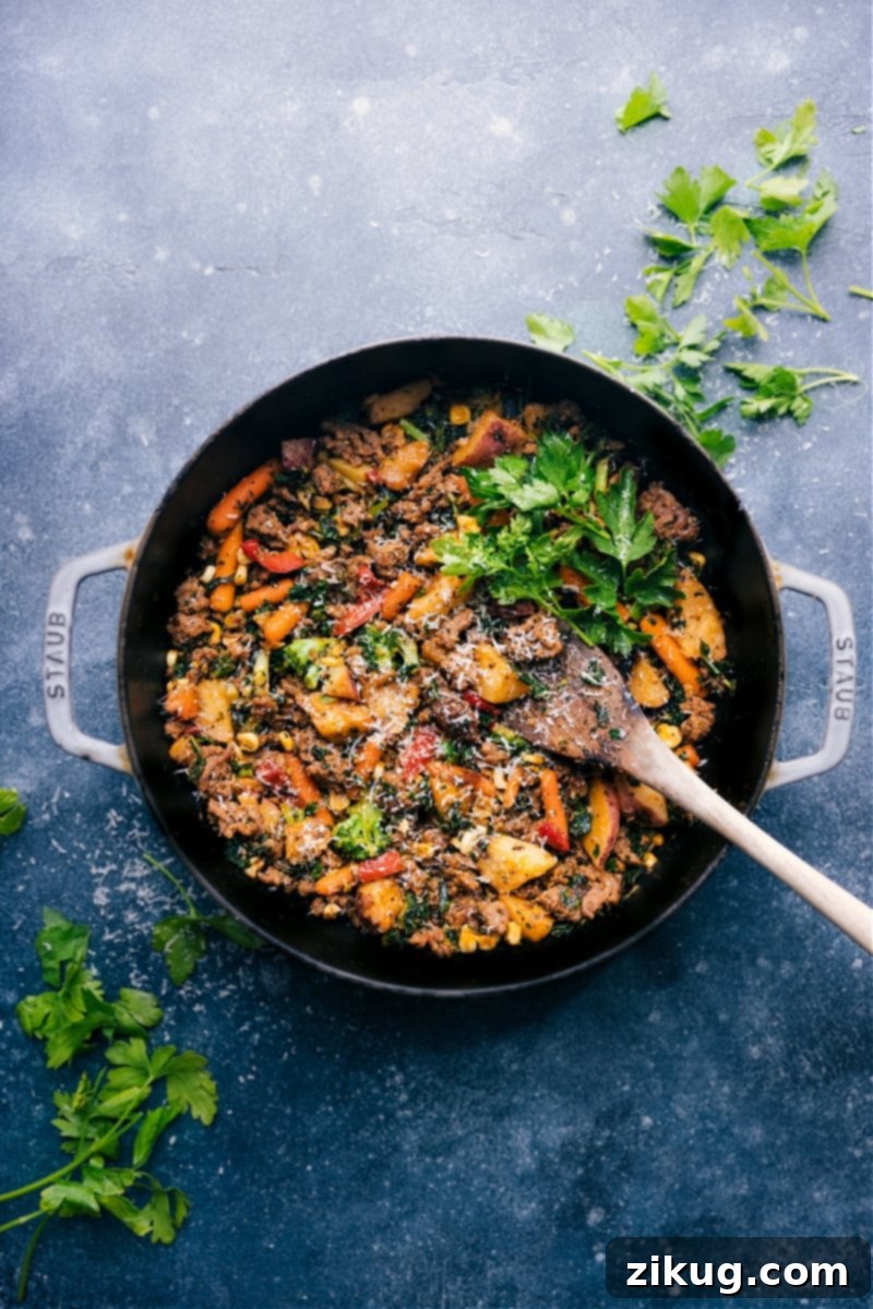 Easy Sausage And Veggie Skillet: Quick, Flavorful & Healthy Dinner Idea with Frozen Veggies #sausageskillet #quickeasy #backtoschool #lifesaver #veggies A vibrant Sausage and Veggie Skillet, fresh from the pan, showcasing browned sausage and colorful, tender-crisp vegetables