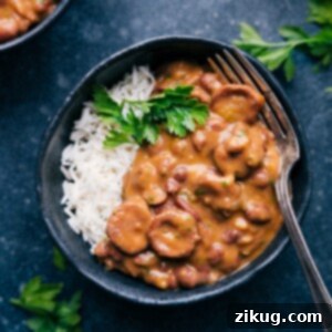 Classic Red Beans and Rice 3 Red Beans And Rice in a bowl with a spoon