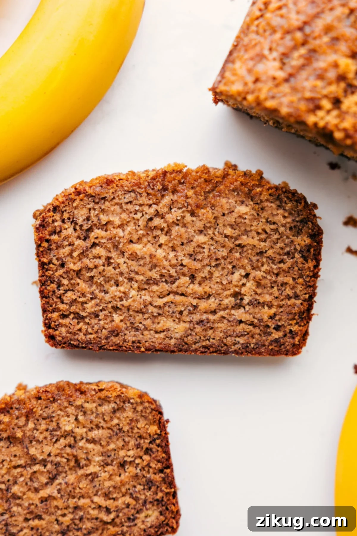 Sliced Healthy Banana Bread A perfectly sliced Greek yogurt banana bread, showcasing its moist, tender interior, ready to be savored.