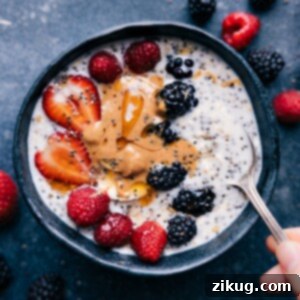 Creamy Make-Ahead Chia Oats 2 Overnight Oats with Chia Seeds in a jar, topped with fresh berries and nuts, ready for a healthy breakfast.