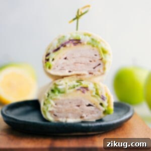 Wholesome Turkey Wraps 2 Healthy Turkey Wraps stacked on top of each other.
