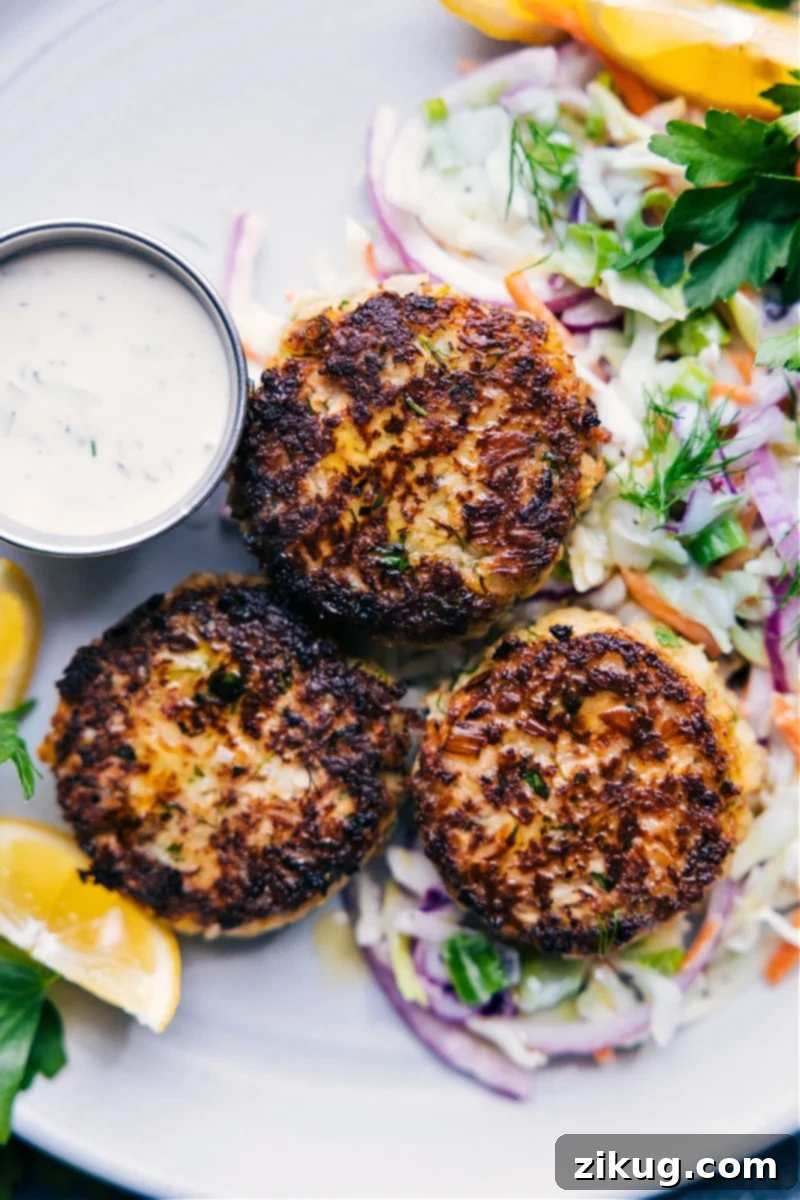 Overhead image of Delicious Crispy Tuna Patties served with coleslaw and tartar sauce