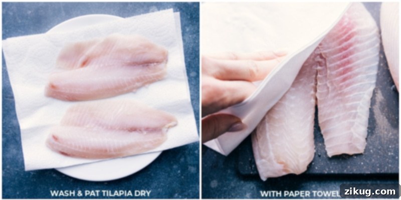 Preparing tilapia: patting fish dry is crucial for optimal seasoning adherence and crispy air frying results. Process shot demonstrating raw tilapia fillets being carefully patted dry with paper towels on a cutting board, an essential step for achieving a crispy air-fried texture.