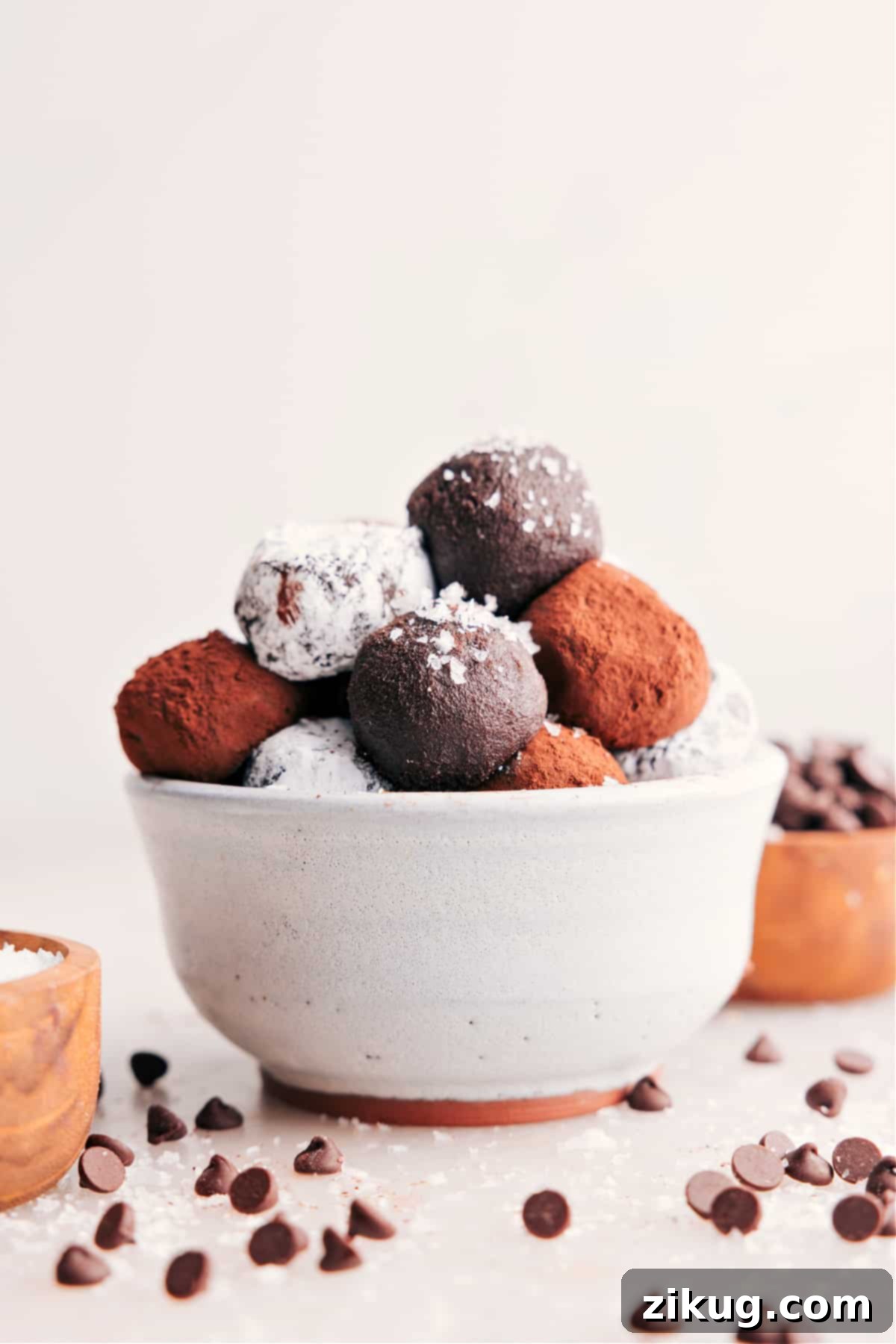 Homemade chocolate truffles arranged elegantly on a serving dish.