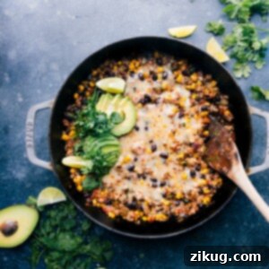 A serving of Green Chile Ground Turkey in a bowl with fresh toppings.
