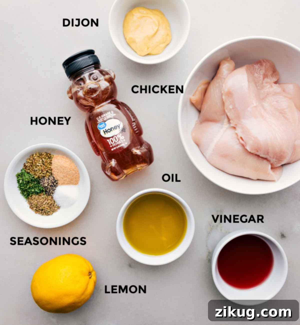 Key Ingredients for the Best Italian Chicken Marinade All the fresh ingredients required for this simple yet potent Italian Chicken Marinade recipe meticulously prepped and laid out on a clean kitchen counter, signifying readiness for easy assembly.