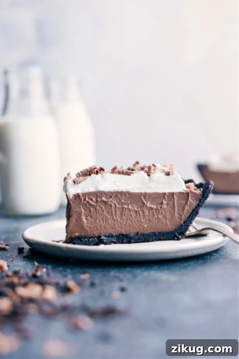 Classic Chocolate Cream Pie Recipe Slice of Chocolate Cream Pie on a plate.