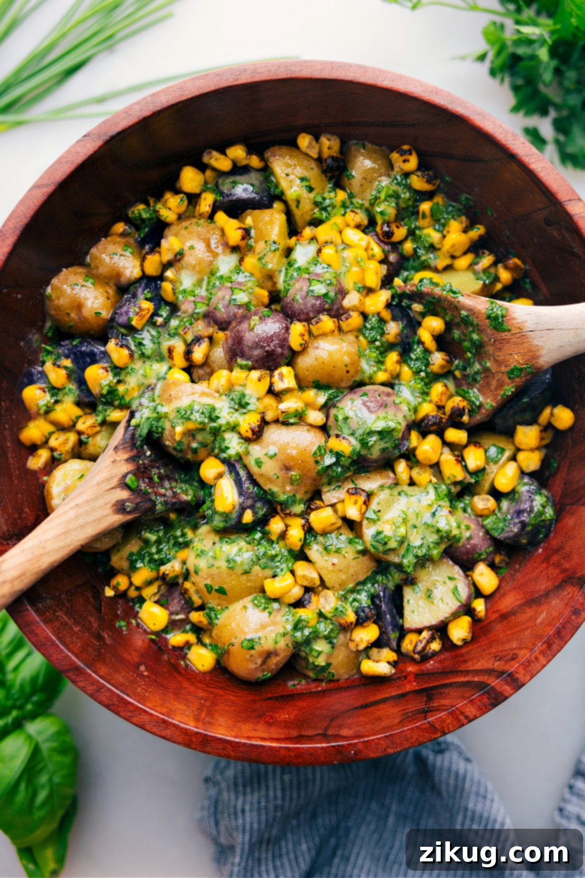 The Best No-Mayo Potato Salad Recipe No-Mayo Potato Salad dressed and in a bowl ready to be served at your next get together.