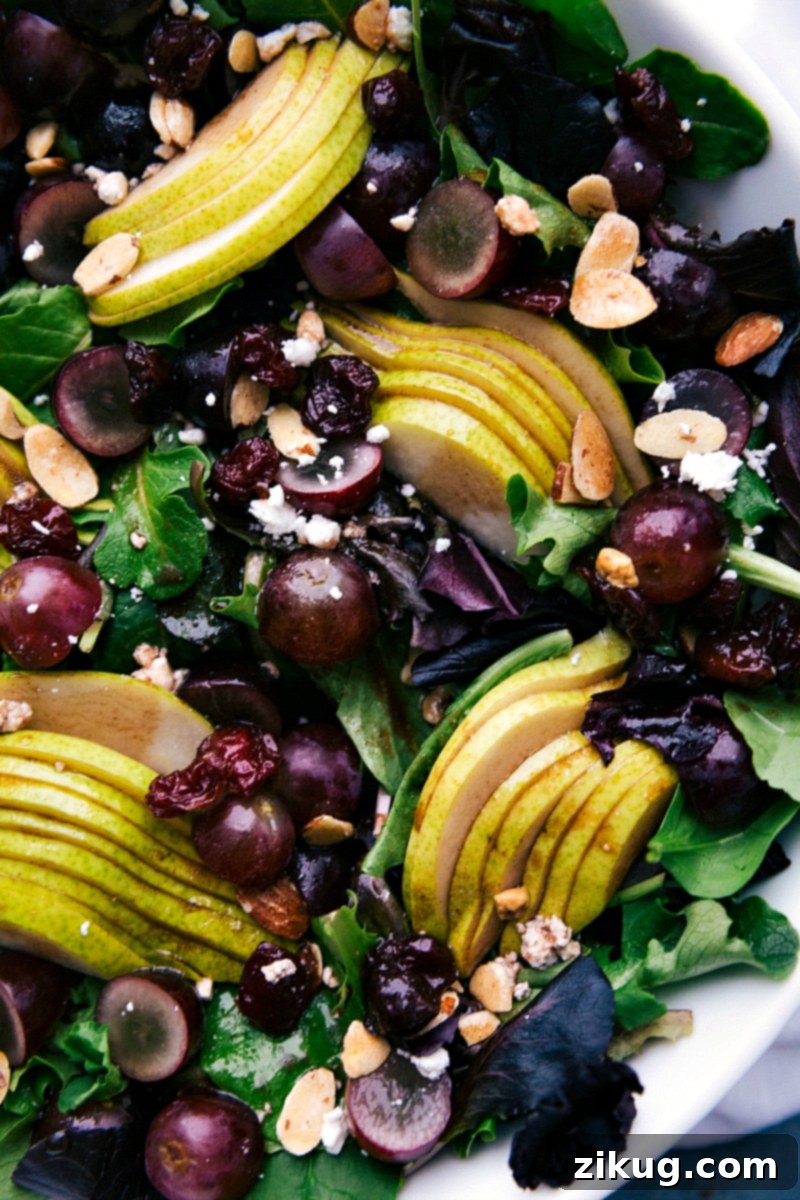 Fresh and Vibrant Salad with a Variety of Ingredients A beautifully dressed side dish, showcasing all its colorful components.