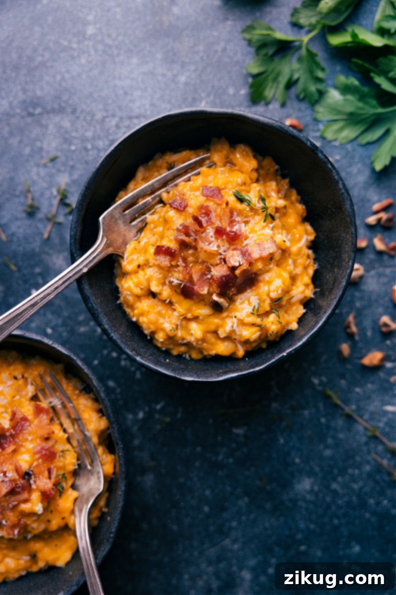 Overhead image of a beautifully plated Instant Pot Sweet Potato Risotto garnished with fresh herbs.