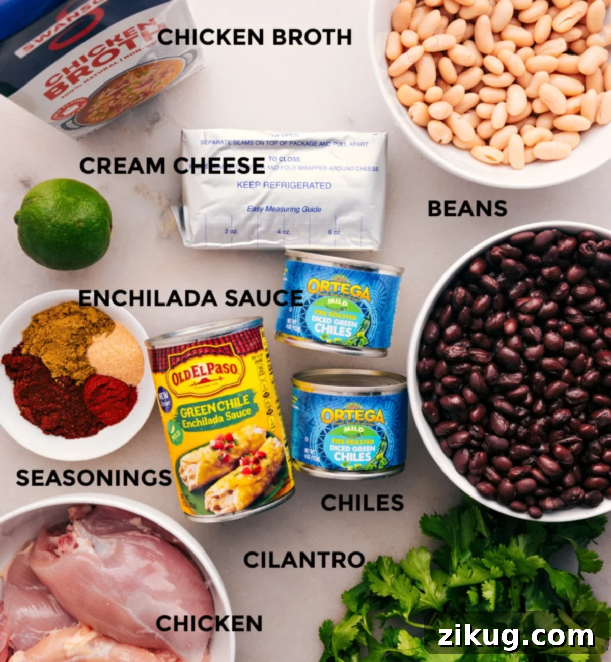 Preparing a Meal: Pouring Ingredients into Slow Cooker All the vibrant ingredients for Green Chicken Enchilada Soup are meticulously prepped for simple slow cooker assembly: a medley of beans, tender chicken, zesty green chiles, rich enchilada sauce, aromatic seasonings, creamy cream cheese, fresh lime, and bright cilantro.