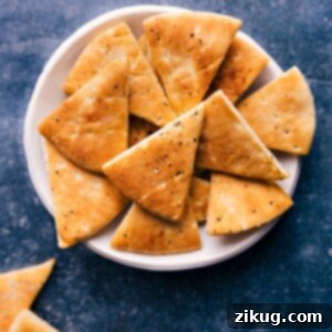 Perfectly golden and crispy homemade pita chips arranged for a recipe card.