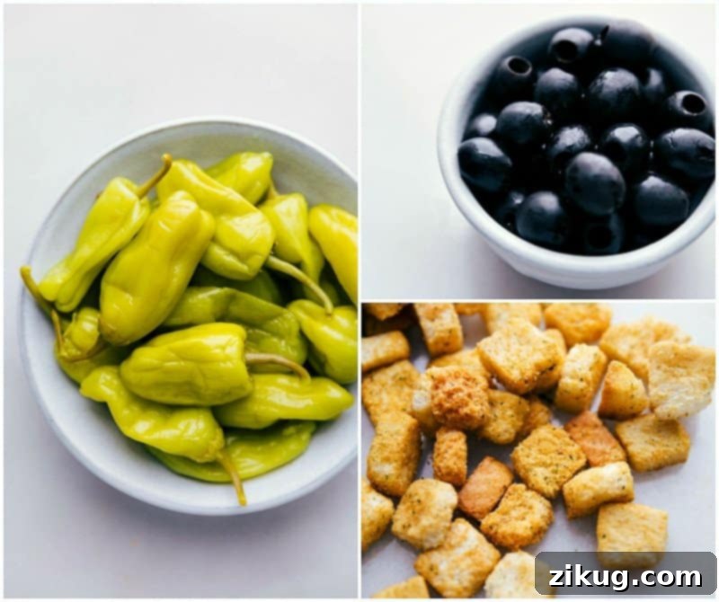 Key Salad Ingredients: Pepperoncini, Croutons, and Olives Ingredients for the salad: pepperoncini, croutons, and olives, ready to enhance the flavor.