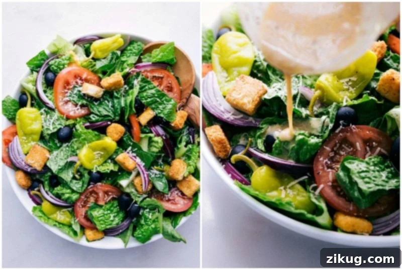 Adding Signature Olive Garden Salad Dressing to Fresh Salad Olive garden salad with the iconic olive garden salad dressing being generously poured over the greens.