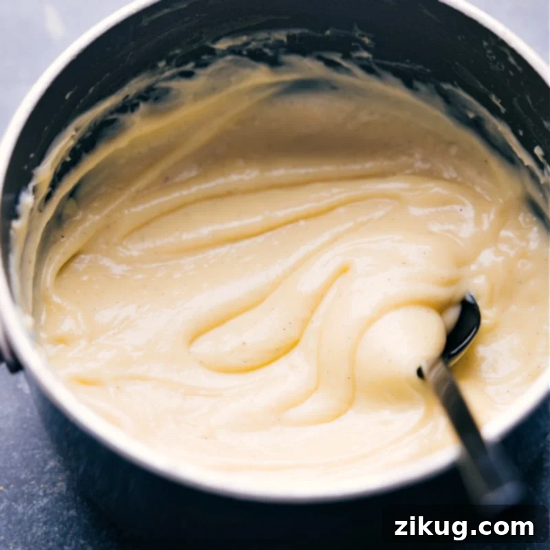 How To Make Custard For Banana Cream Pie Making the custard for this banana cream pie, showing its thick texture.