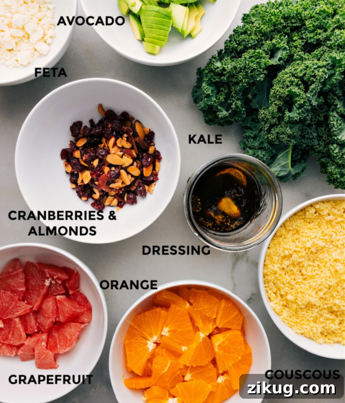 Ingredients In Grapefruit Salad All the fresh ingredients for this delicious grapefruit salad are neatly prepped and laid out on a counter, ready for assembly.