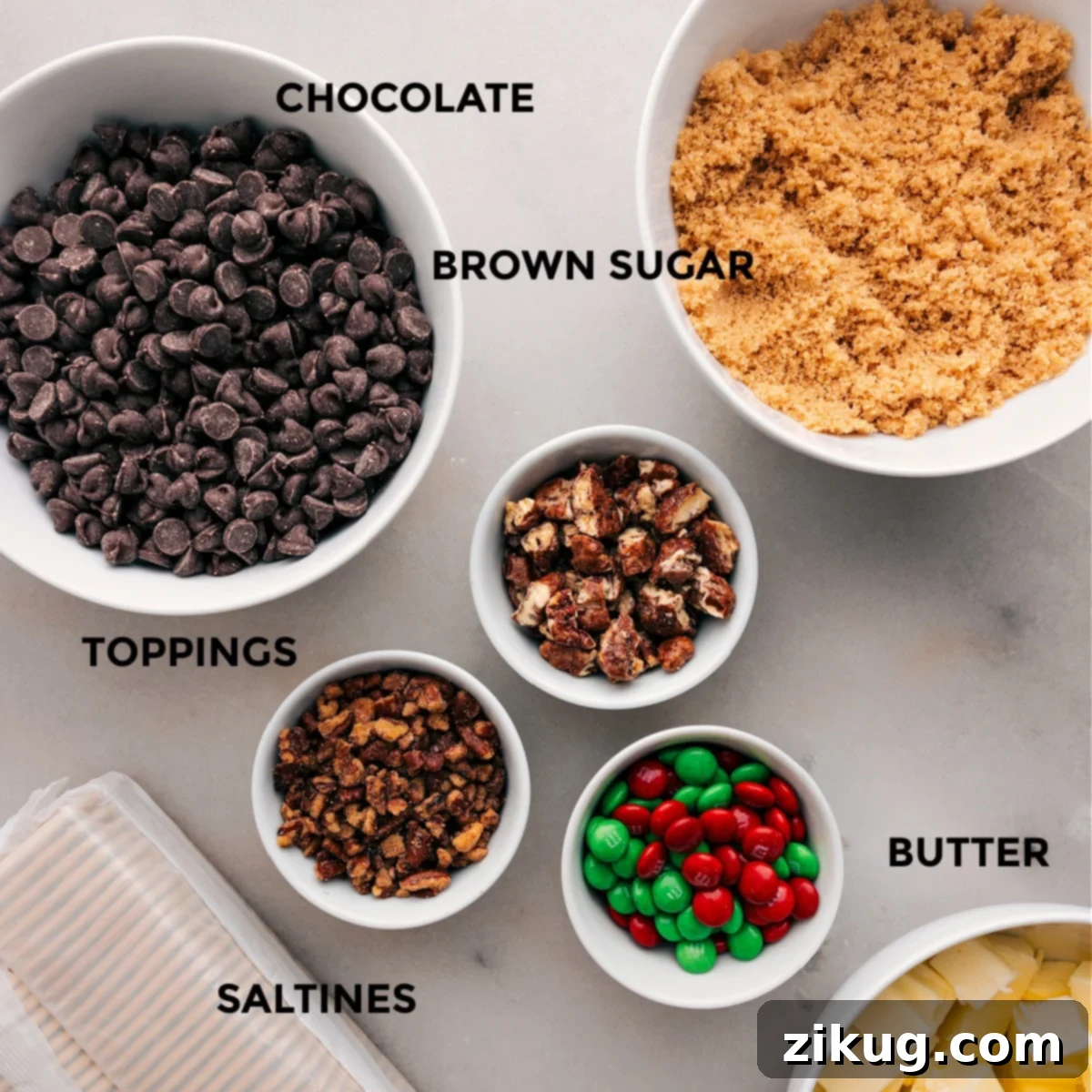 Christmas Crack (AKA Saltine Toffee) Basic Ingredients The ingredients for this recipe are prepped for easy assembly: chocolate chips, brown sugar, toppings, butter, and saltine crackers.