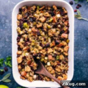 A final close-up image of the golden-brown Sausage Stuffing in a baking dish, ready to serve.