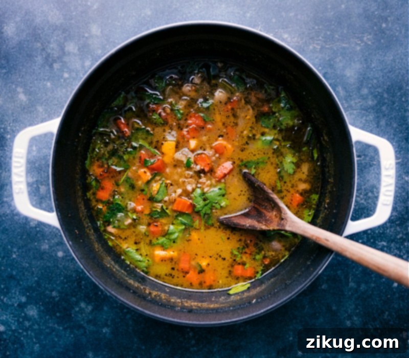 A large pot of Farro Soup, perfectly cooked and ready to be served, showcasing its one-pot convenience.