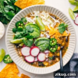 Quick Chicken Pozole Verde in a bowl with toppings