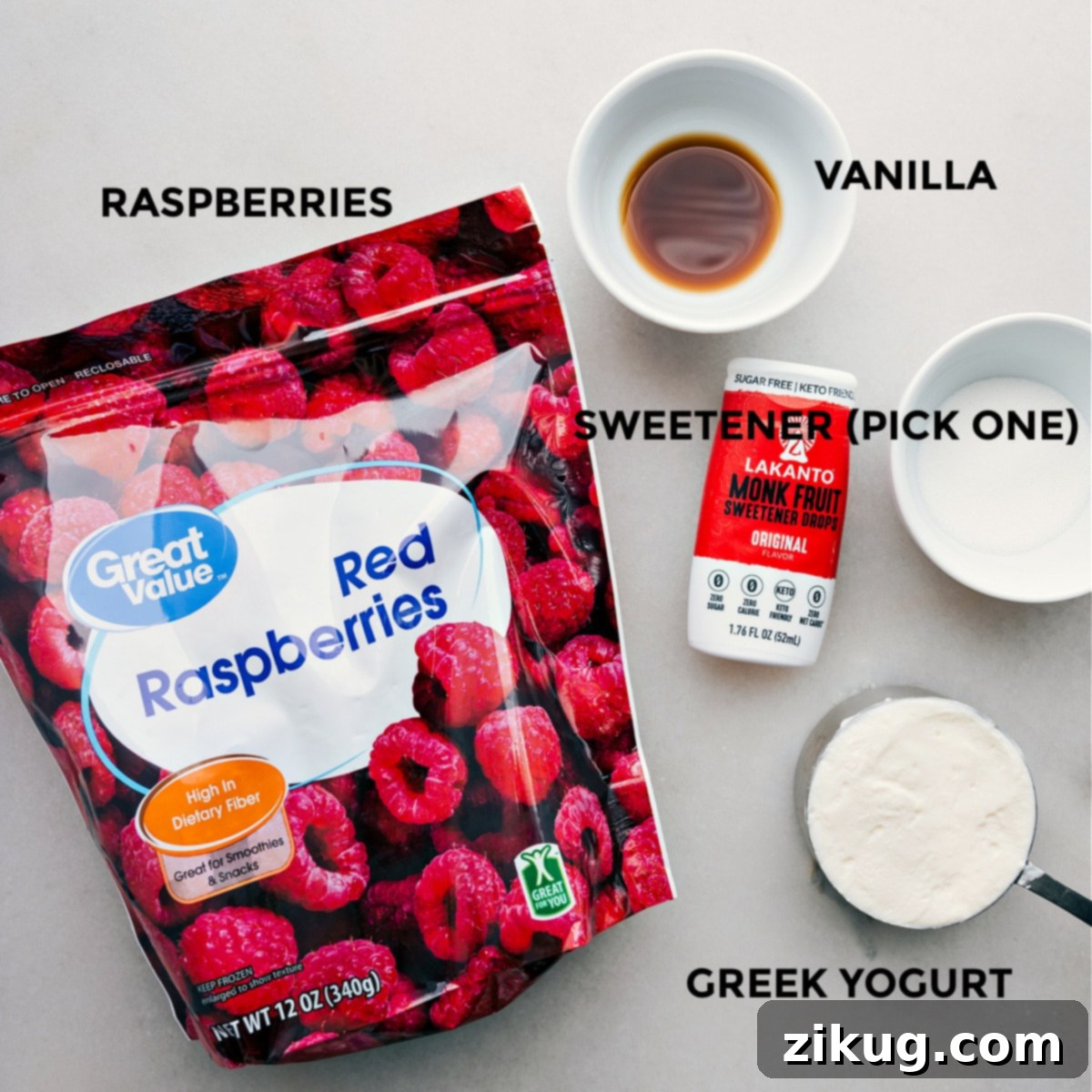 All the essential ingredients for making delicious raspberry frozen yogurt, neatly prepped and laid out for easy assembly.