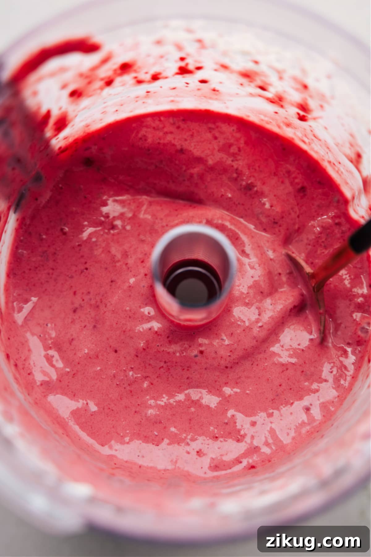 The perfectly blended frozen yogurt mixture, ready to be served directly from the food processor.