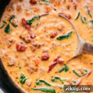 Delicious Creamy Tuscan Soup, showcasing its rich texture and hearty ingredients
